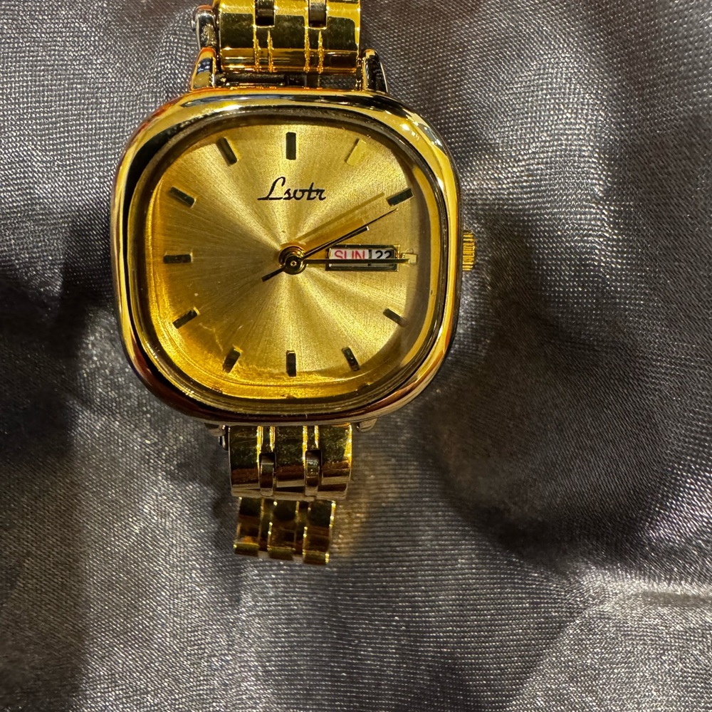 Gold Lsvtr Watch with Date Display